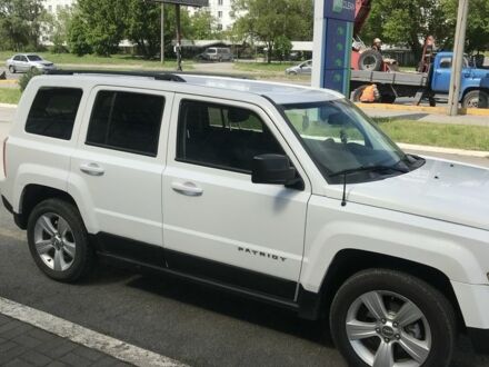 Белый Джип Патриот, объемом двигателя 2.4 л и пробегом 120 тыс. км за 10500 $, фото 1 на Automoto.ua