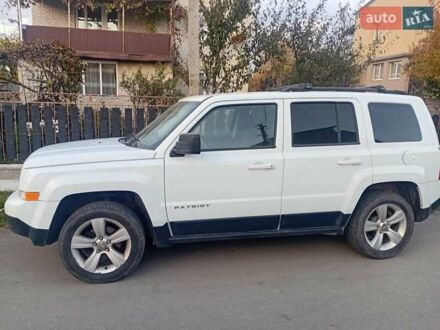 Белый Джип Патриот, объемом двигателя 2.36 л и пробегом 160 тыс. км за 8800 $, фото 1 на Automoto.ua