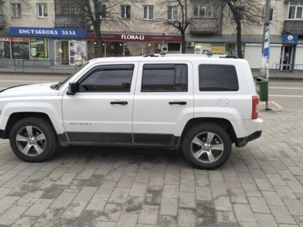 Білий Джип Patriot, об'ємом двигуна 2.4 л та пробігом 78 тис. км за 13600 $, фото 1 на Automoto.ua