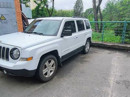 Білий Джип Patriot, об'ємом двигуна 2.4 л та пробігом 64 тис. км за 11500 $, фото 1 на Automoto.ua