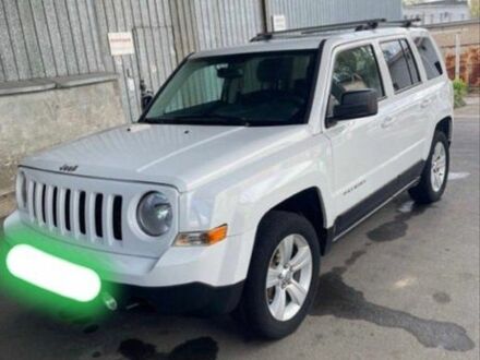 Білий Джип Patriot, об'ємом двигуна 2.4 л та пробігом 135 тис. км за 10000 $, фото 1 на Automoto.ua