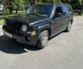 Черный Джип Патриот, объемом двигателя 2.4 л и пробегом 250 тыс. км за 5900 $, фото 1 на Automoto.ua