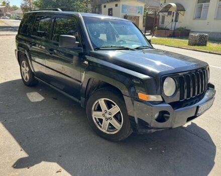 Черный Джип Патриот, объемом двигателя 2.4 л и пробегом 250 тыс. км за 5900 $, фото 1 на Automoto.ua