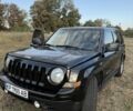 Чорний Джип Patriot, об'ємом двигуна 2 л та пробігом 201 тис. км за 8437 $, фото 1 на Automoto.ua