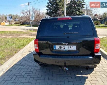 Чорний Джип Patriot, об'ємом двигуна 2 л та пробігом 285 тис. км за 4800 $, фото 4 на Automoto.ua