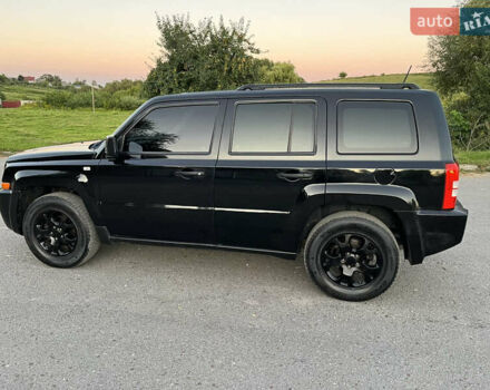 Черный Джип Патриот, объемом двигателя 2.36 л и пробегом 251 тыс. км за 6250 $, фото 5 на Automoto.ua