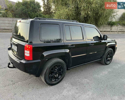 Черный Джип Патриот, объемом двигателя 2.36 л и пробегом 251 тыс. км за 6250 $, фото 10 на Automoto.ua