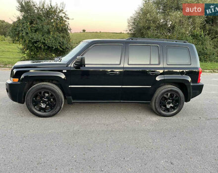 Черный Джип Патриот, объемом двигателя 2.36 л и пробегом 251 тыс. км за 6250 $, фото 4 на Automoto.ua