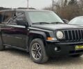 Чорний Джип Patriot, об'ємом двигуна 2.4 л та пробігом 247 тис. км за 6500 $, фото 1 на Automoto.ua