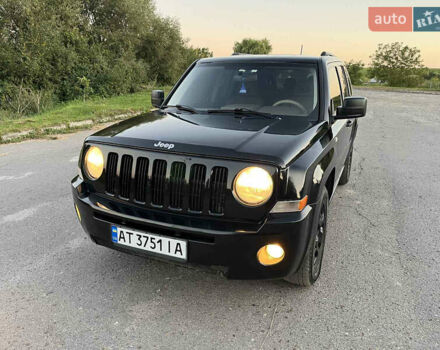 Черный Джип Патриот, объемом двигателя 2.36 л и пробегом 251 тыс. км за 6350 $, фото 2 на Automoto.ua