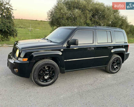 Черный Джип Патриот, объемом двигателя 2.36 л и пробегом 251 тыс. км за 6250 $, фото 3 на Automoto.ua