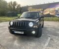 Чорний Джип Patriot, об'ємом двигуна 2.4 л та пробігом 245 тис. км за 6800 $, фото 1 на Automoto.ua