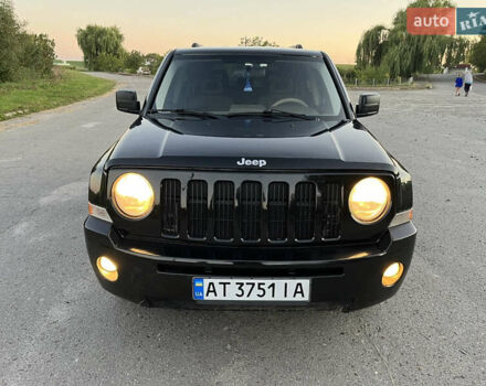 Черный Джип Патриот, объемом двигателя 2.36 л и пробегом 251 тыс. км за 6250 $, фото 1 на Automoto.ua