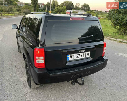 Черный Джип Патриот, объемом двигателя 2.36 л и пробегом 251 тыс. км за 6350 $, фото 7 на Automoto.ua