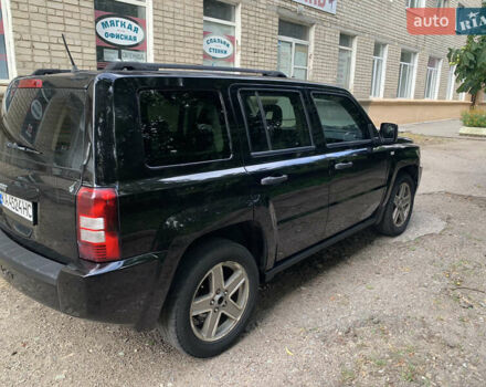 Черный Джип Патриот, объемом двигателя 2.36 л и пробегом 380 тыс. км за 5900 $, фото 3 на Automoto.ua