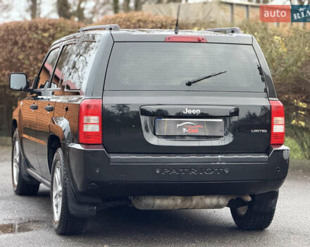 Черный Джип Патриот, объемом двигателя 2.36 л и пробегом 150 тыс. км за 7900 $, фото 5 на Automoto.ua