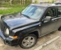 Чорний Джип Patriot, об'ємом двигуна 2.4 л та пробігом 240 тис. км за 6200 $, фото 1 на Automoto.ua