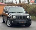 Черный Джип Патриот, объемом двигателя 2.36 л и пробегом 150 тыс. км за 7900 $, фото 1 на Automoto.ua