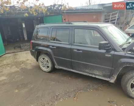 Черный Джип Патриот, объемом двигателя 2.36 л и пробегом 280 тыс. км за 4500 $, фото 9 на Automoto.ua