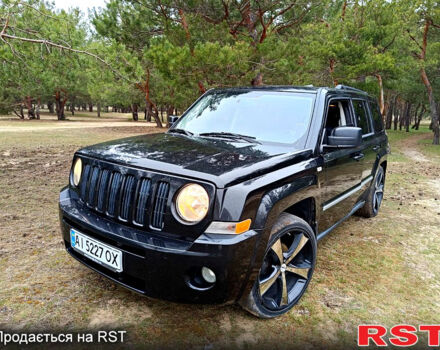 Черный Джип Патриот, объемом двигателя 2 л и пробегом 260 тыс. км за 7200 $, фото 1 на Automoto.ua