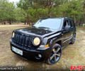 Черный Джип Патриот, объемом двигателя 2 л и пробегом 260 тыс. км за 7200 $, фото 1 на Automoto.ua