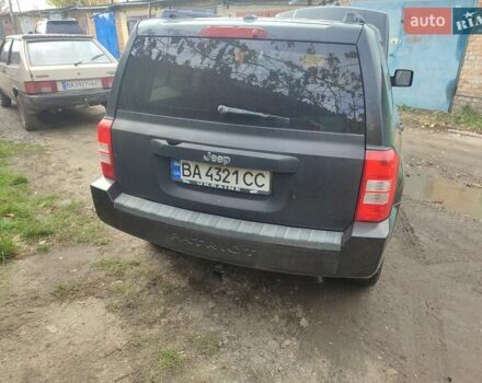 Черный Джип Патриот, объемом двигателя 2.36 л и пробегом 280 тыс. км за 4500 $, фото 6 на Automoto.ua