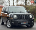 Черный Джип Патриот, объемом двигателя 2.36 л и пробегом 150 тыс. км за 7900 $, фото 1 на Automoto.ua