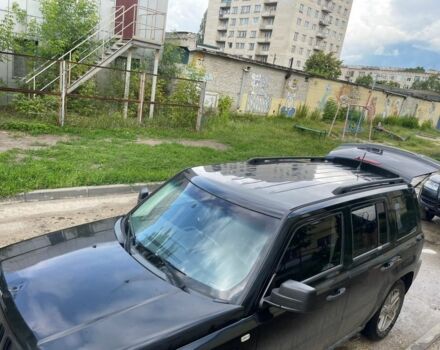 Чорний Джип Patriot, об'ємом двигуна 2.4 л та пробігом 240 тис. км за 6200 $, фото 1 на Automoto.ua