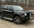 Чорний Джип Patriot, об'ємом двигуна 2 л та пробігом 240 тис. км за 8500 $, фото 1 на Automoto.ua