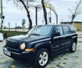 Чорний Джип Patriot, об'ємом двигуна 2.4 л та пробігом 200 тис. км за 8299 $, фото 1 на Automoto.ua