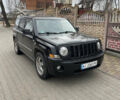 Чорний Джип Patriot, об'ємом двигуна 2.4 л та пробігом 225 тис. км за 9300 $, фото 1 на Automoto.ua