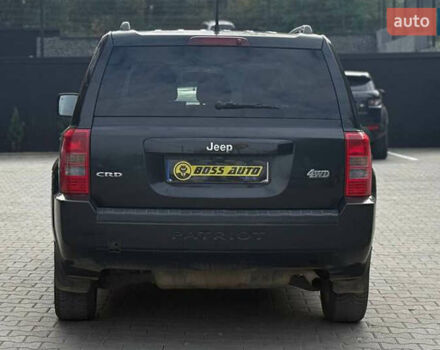 Черный Джип Патриот, объемом двигателя 2.14 л и пробегом 226 тыс. км за 11000 $, фото 4 на Automoto.ua