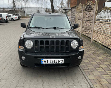 Чорний Джип Patriot, об'ємом двигуна 2.4 л та пробігом 225 тис. км за 9300 $, фото 1 на Automoto.ua