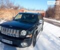 Чорний Джип Patriot, об'ємом двигуна 2.2 л та пробігом 216 тис. км за 12500 $, фото 1 на Automoto.ua