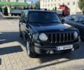 Черный Джип Патриот, объемом двигателя 2.4 л и пробегом 260 тыс. км за 6800 $, фото 1 на Automoto.ua