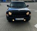 Чорний Джип Patriot, об'ємом двигуна 2.4 л та пробігом 260 тис. км за 8350 $, фото 1 на Automoto.ua