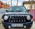 Чорний Джип Patriot, об'ємом двигуна 2.4 л та пробігом 245 тис. км за 8850 $, фото 1 на Automoto.ua
