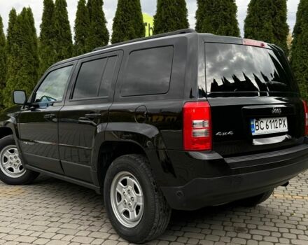 Черный Джип Патриот, объемом двигателя 2.4 л и пробегом 195 тыс. км за 7999 $, фото 2 на Automoto.ua