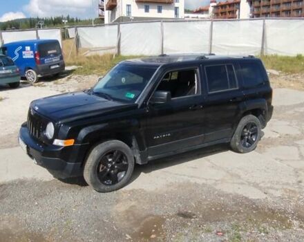Черный Джип Патриот, объемом двигателя 2.36 л и пробегом 127 тыс. км за 8400 $, фото 1 на Automoto.ua