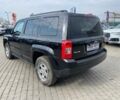 Черный Джип Патриот, объемом двигателя 2.4 л и пробегом 310 тыс. км за 8800 $, фото 4 на Automoto.ua