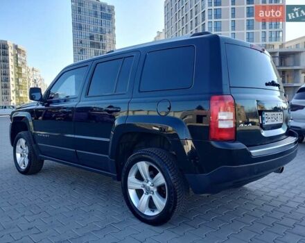Черный Джип Патриот, объемом двигателя 2.36 л и пробегом 220 тыс. км за 12000 $, фото 1 на Automoto.ua