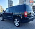 Черный Джип Патриот, объемом двигателя 2.36 л и пробегом 220 тыс. км за 12000 $, фото 1 на Automoto.ua