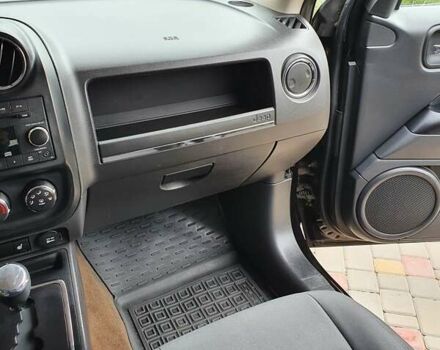 Черный Джип Патриот, объемом двигателя 2.36 л и пробегом 155 тыс. км за 10500 $, фото 9 на Automoto.ua