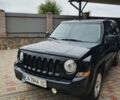 Черный Джип Патриот, объемом двигателя 2.4 л и пробегом 154 тыс. км за 10500 $, фото 1 на Automoto.ua