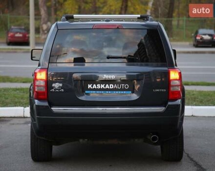 Черный Джип Патриот, объемом двигателя 2.36 л и пробегом 230 тыс. км за 9600 $, фото 4 на Automoto.ua