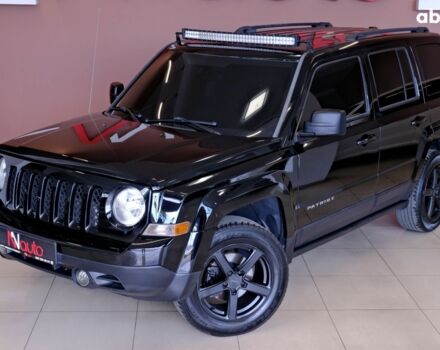 Черный Джип Патриот, объемом двигателя 2.4 л и пробегом 123 тыс. км за 9900 $, фото 1 на Automoto.ua