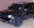 Черный Джип Патриот, объемом двигателя 2.4 л и пробегом 123 тыс. км за 9900 $, фото 1 на Automoto.ua