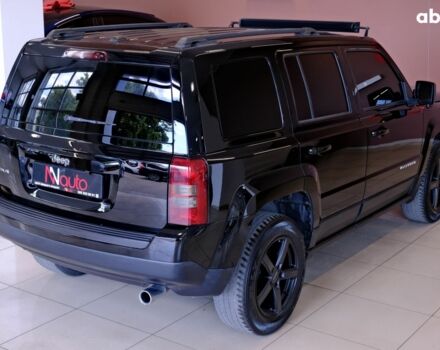 Черный Джип Патриот, объемом двигателя 2.4 л и пробегом 123 тыс. км за 9900 $, фото 4 на Automoto.ua