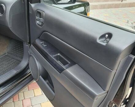 Черный Джип Патриот, объемом двигателя 2.36 л и пробегом 155 тыс. км за 10500 $, фото 11 на Automoto.ua