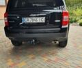 Черный Джип Патриот, объемом двигателя 2.36 л и пробегом 155 тыс. км за 10500 $, фото 1 на Automoto.ua